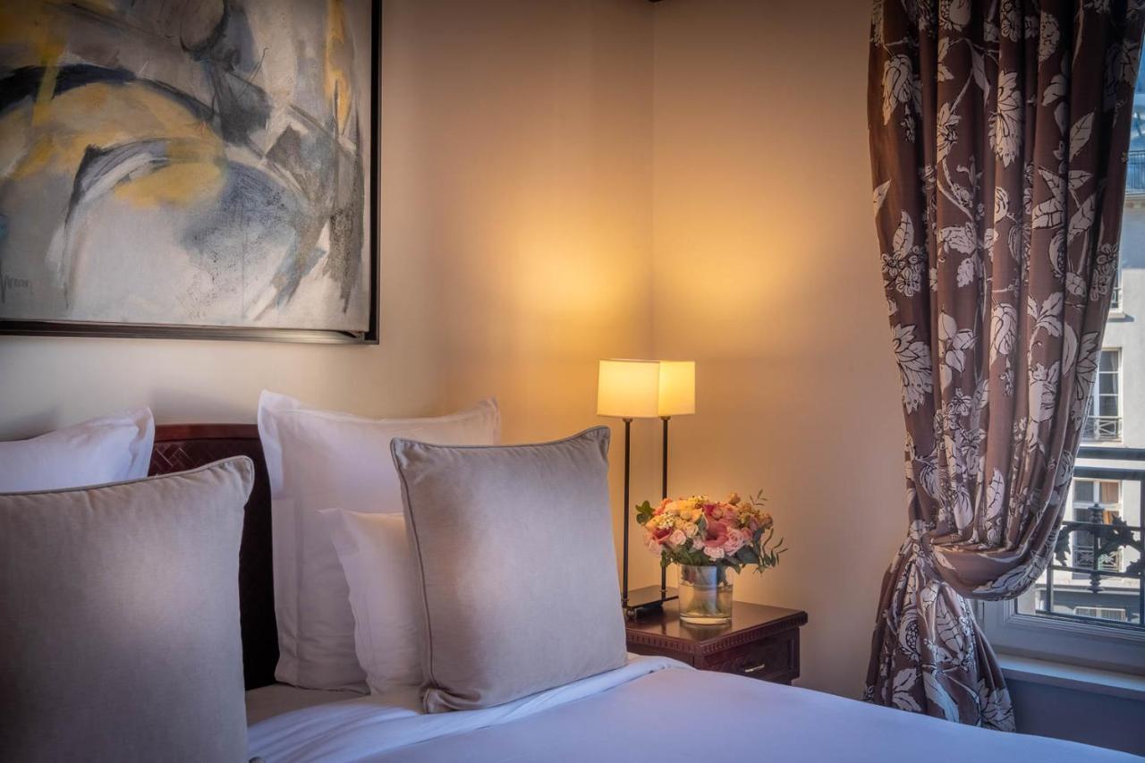 Hotel Pont Royal Paris Exterior foto A bedroom at the hotel